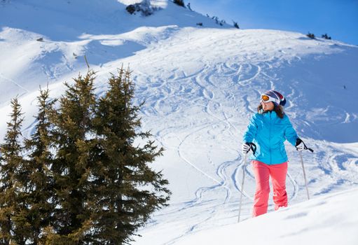 Ski, winter, snow, skiers, sun and fun - Middle Aged Woman On Ski Holiday In Mountains