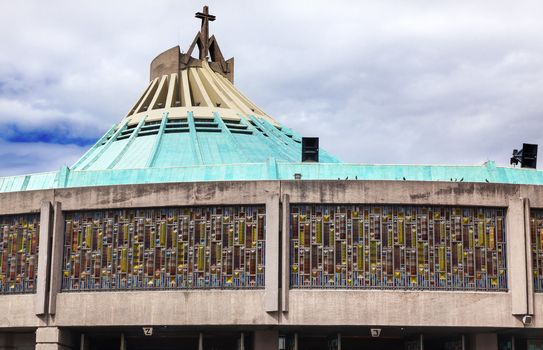 New Basilica Christmas Creche Shrine of the Guadalupe Mexico City Mexico. Also known as Basilica de Nuestra de la Senora Guadalupe.  Basilica construction was started in 1972, finished 1974.  This basilica is the location where the Virgin Mary appeared to the Meixcan peasant Juan Diego and where Juan Diego's original cloak with the picture of the Virgin Mary is located.  