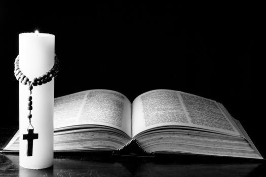 Bible, candle and the mystery of death