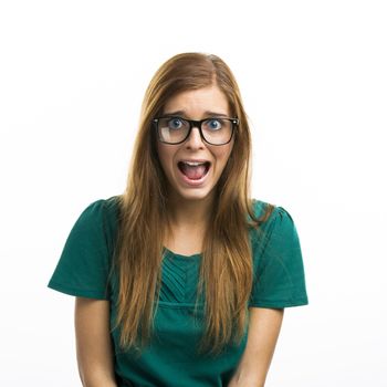 Portrait of a beautiful girl with a fear expression isolated on white background