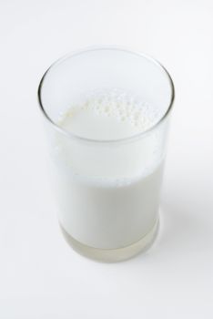 glass milk on white background