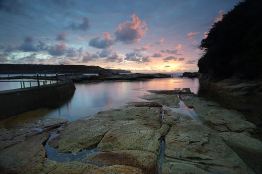 Sunrise over beautiful Malabar, just 12km from Sydney CBD.  This natural rock pool lies beside the man made one.  Malabar was named Boora by the local indigenous community.