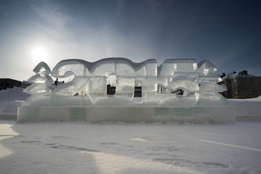 Two Christmas trees and figures of the New 2015 made of ice.