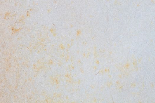 texture of old paper with yellow stain, background