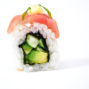 traditional fresh japanese sushi rolls on a white background