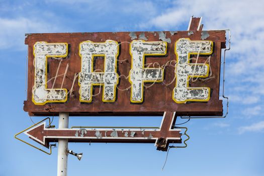 Vintage restaurant sign with paint and neon