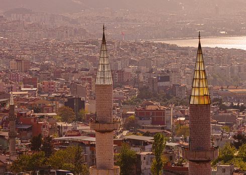 Two minarets in the Turkish port city of Izmir