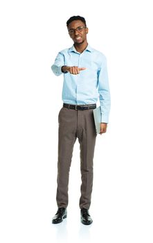 Happy african american college student with laptop and finger up  standing on white background