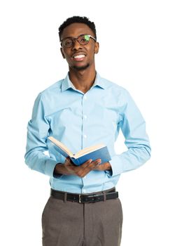Happy african american college student with books in his hands  standing on white background