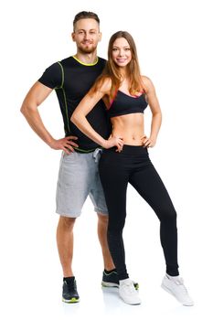 Sport couple - man and woman after fitness exercise on the white background
