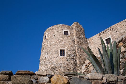 An old building in Chora at the Naxos island at the Cyclades of the Aegean sea in Greece