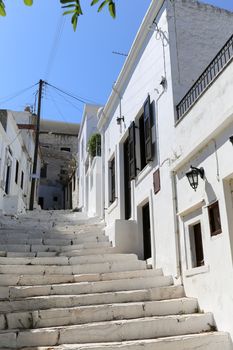 The small streets of Apiranthos at the Naxos island at the Cyclades of the Aegean sea in Greece