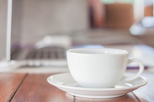 White coffee cup on work station, stock photo