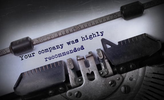 Vintage inscription made by old typewriter, Your company was highly recommended