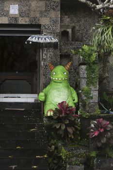 Strange green fello, atracting attention of the passers by.
Ubud. Bali. Indonesia. 