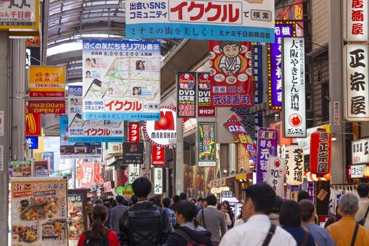 Osaka, Japan - Oct 26: People visiting a shopping street in Namba district of Osaka, Japan on Oct 26, 2014. Namba is one of the popular travel destination in Osaka, Japan