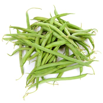 raw long green beans over white background