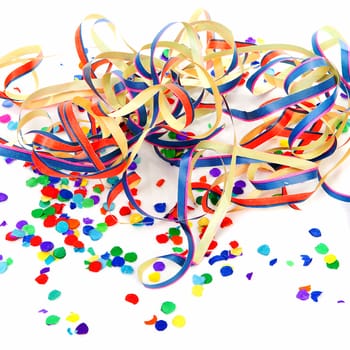 colorful confetti and party streamers over white background