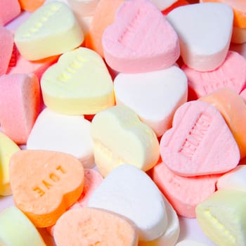 background of candy in shape of hearts