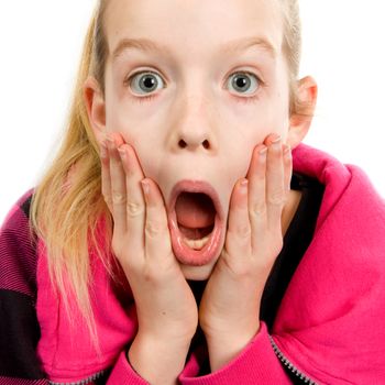 Girl who looks amazed in closeup over white background