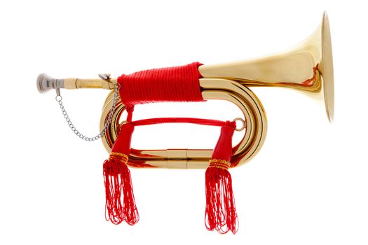 Golden horn with red rope over white background