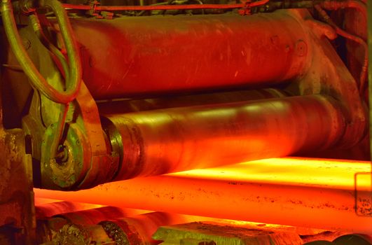 hot steel on conveyor inside of steel plant