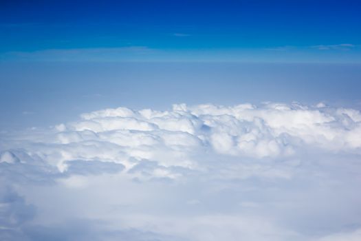 blue sky above overcast cloud air view background only