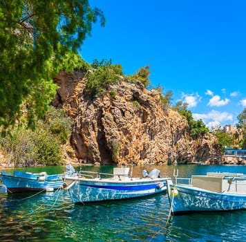 Boats on Lake Voulismeni. Agios Nikolaos, Crete, Greece
