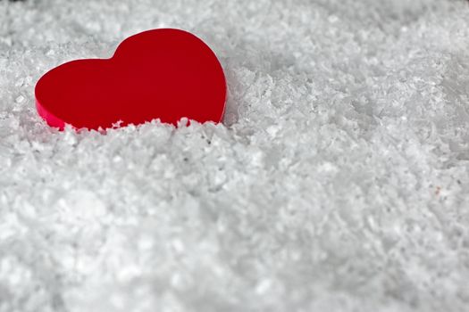 red heart in soft snow