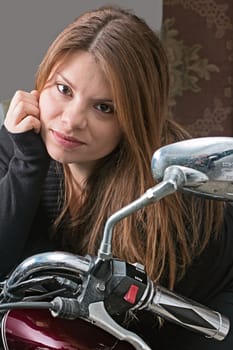 girl posing on motorcycle