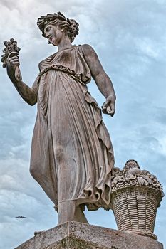 statue of a woman in piazza of popolo