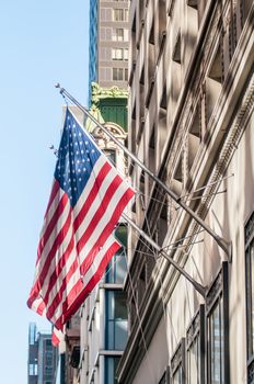 american flag on a historic building