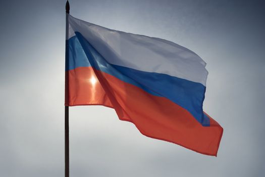 TOn the sun the sky the flag of the Russian Federation.he Flag Of The Russian Federation