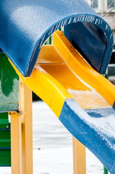 snow and ice covered playground