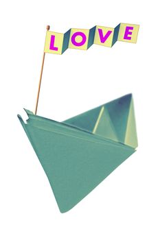 Origami paper boat with flag writing LOVE