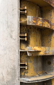 Rusty metal formwork used for building the concrete constructions.