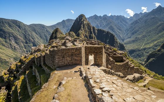 Machu Picchu entrance gate in the ruined city