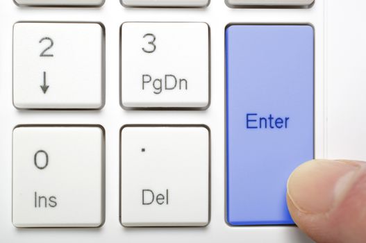 Pressing blue enter key on keyboard