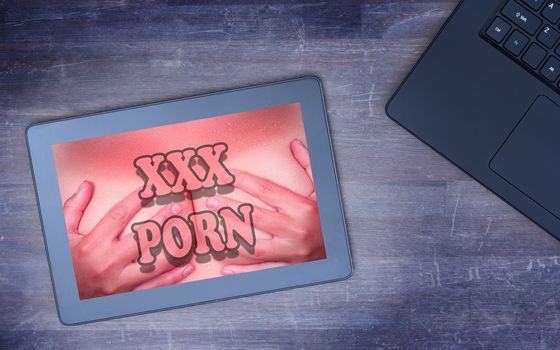 Searching online for porn, XXX on a tablet