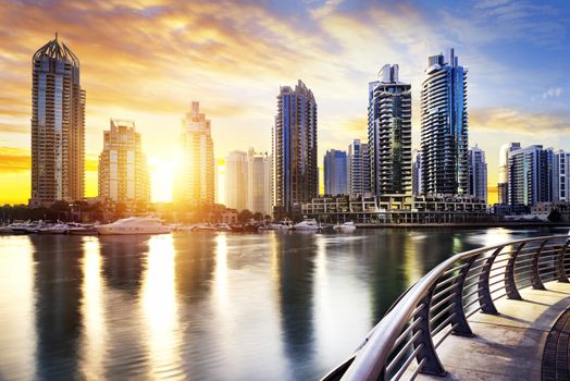 skyline of Dubai Marina at night with boats, United Arab Emirates, Middle East