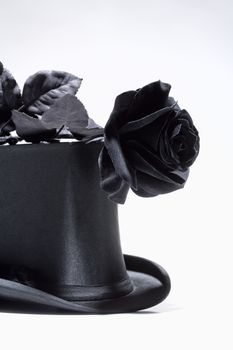 Black Top Hat and Black Rose - Isolated on White