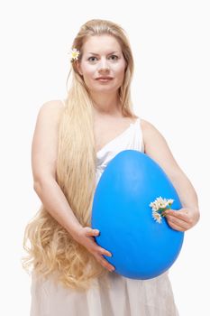 Easter - Young Woman with Long Blond Hair and Large Blue Egg.