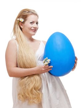 Easter - Young Woman with Long Blond Hair and Large Blue Egg.