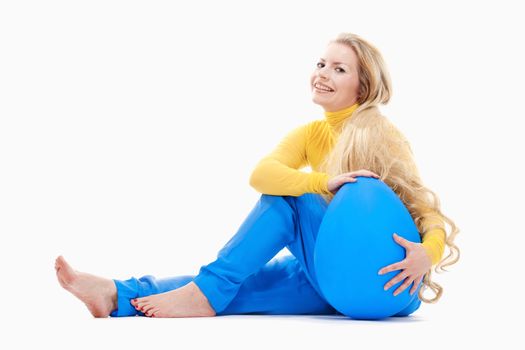 Easter - Young Woman with Long Blond Hair and Large Blue Egg.