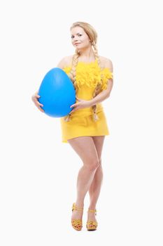 Easter - Young Woman with Long Blond Hair, Yellow Dress and Large Blue Egg.