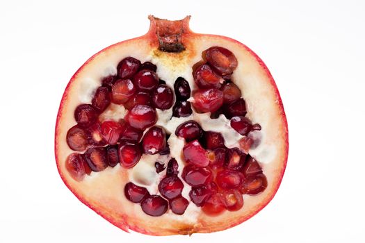 secctioned pomegranate isolated on white background