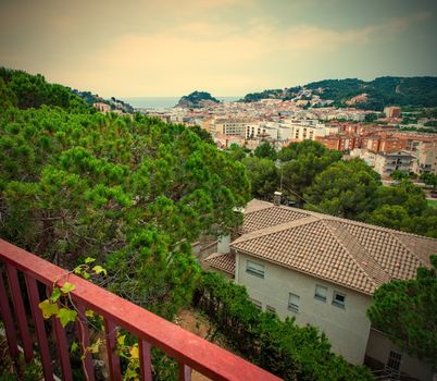 Tossa de Mar, Catalonya, Spain. panorama of the seaside town at summer cloudy day. instagram image retro style
