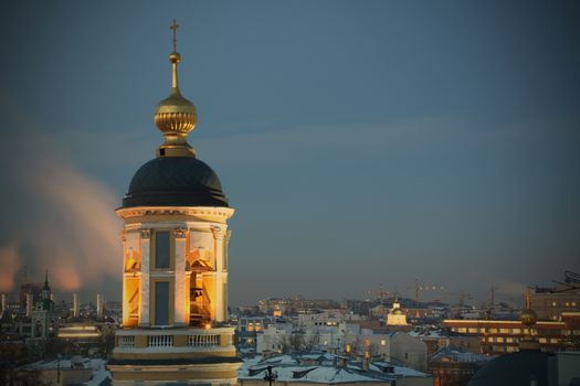 Moscow, Russia, Dome, Spire and Bell tower of the Orthodox Temple in Zamoskvorechie at Evening Time, instagram image style