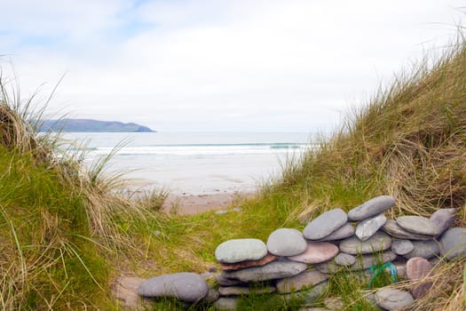 stone wall shelter on a beautiful beach in the maharees county Kerry Ireland