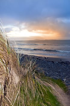 a beautiful view from the sand dunes of Beal beach and sunset in county Kerry Ireland